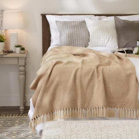 Soft cotton weave for a cozy, boho touch that warms up any space.